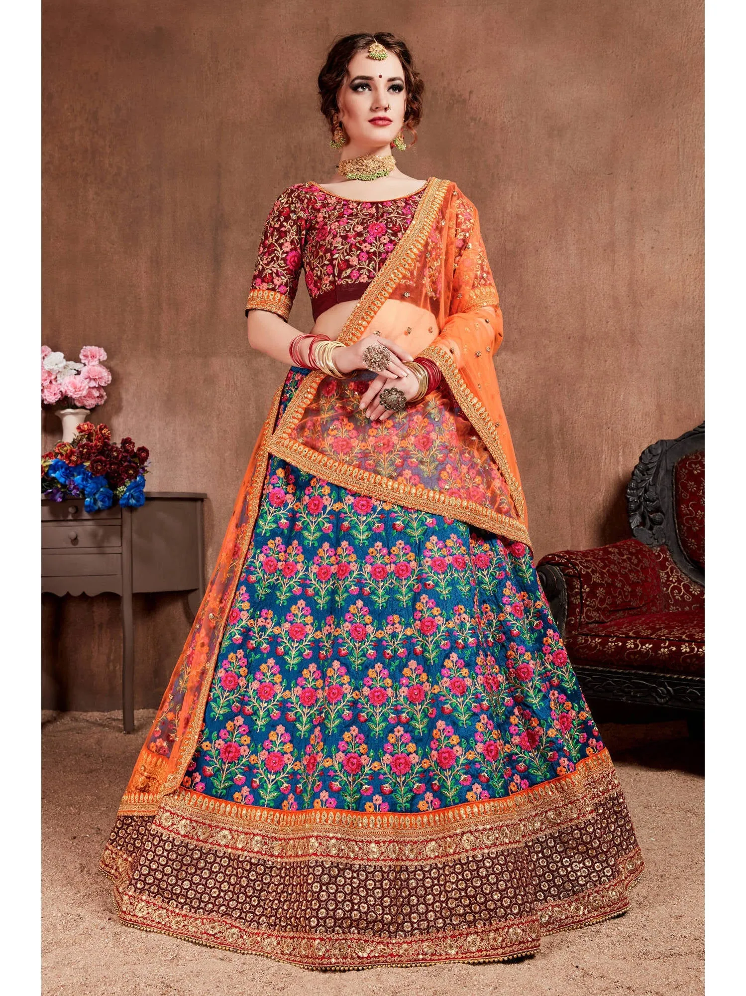 Intricate Navy Blue Colored Bridal wear Embroidered Lehenga Choli