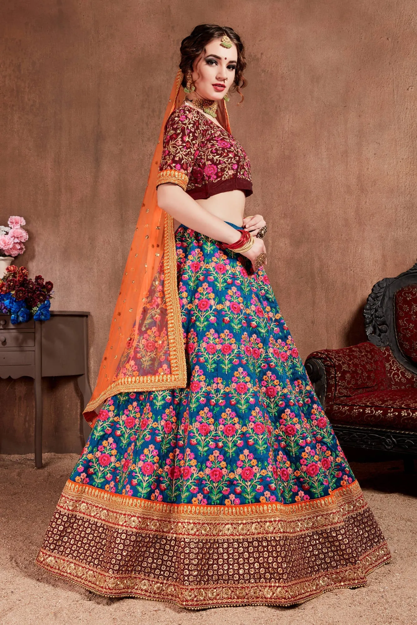 Intricate Navy Blue Colored Bridal wear Embroidered Lehenga Choli