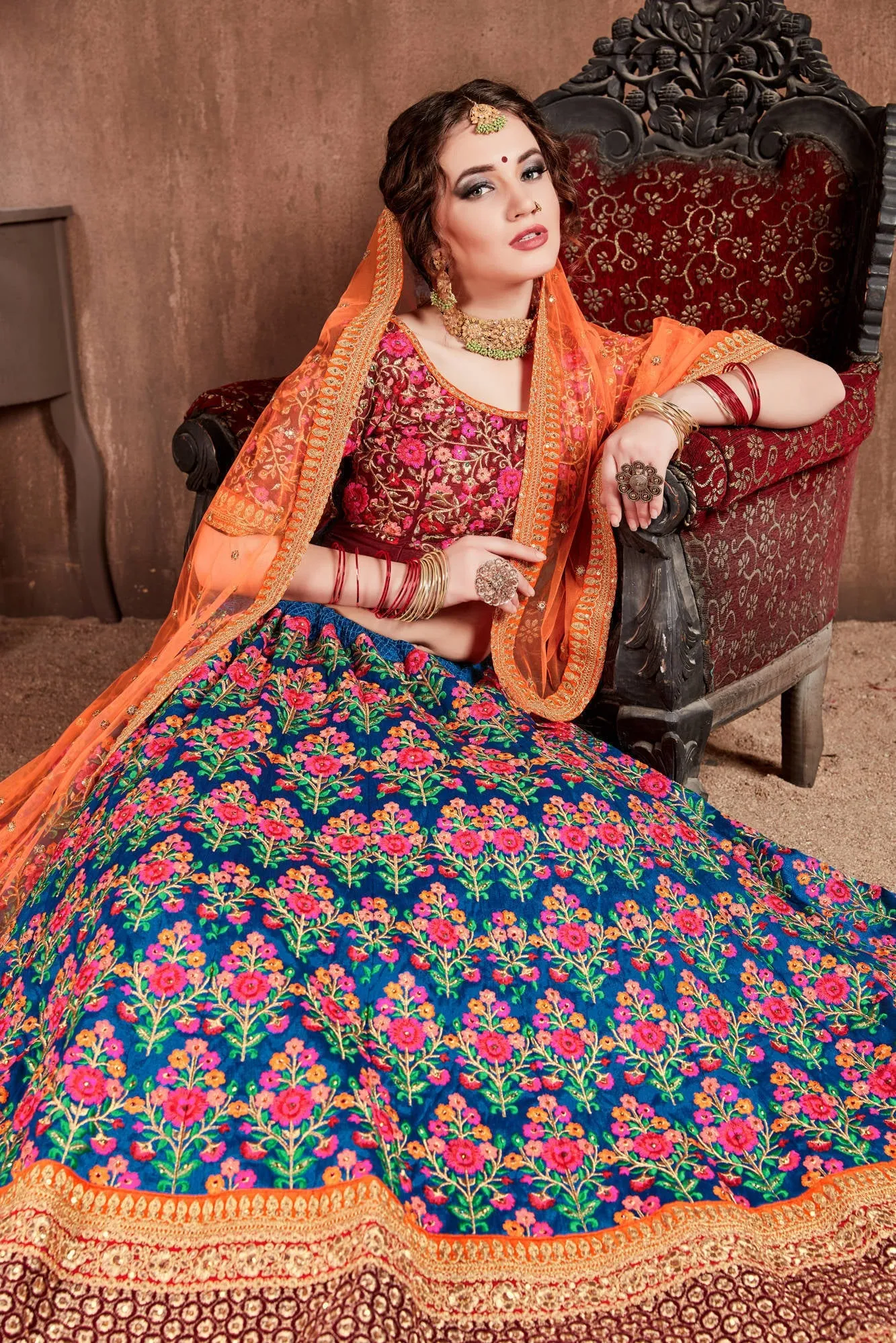 Intricate Navy Blue Colored Bridal wear Embroidered Lehenga Choli