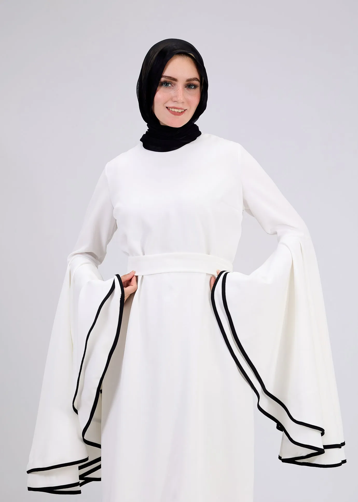 Wurood Elegant White Flared Sleeve Modest Dress with Black Trim