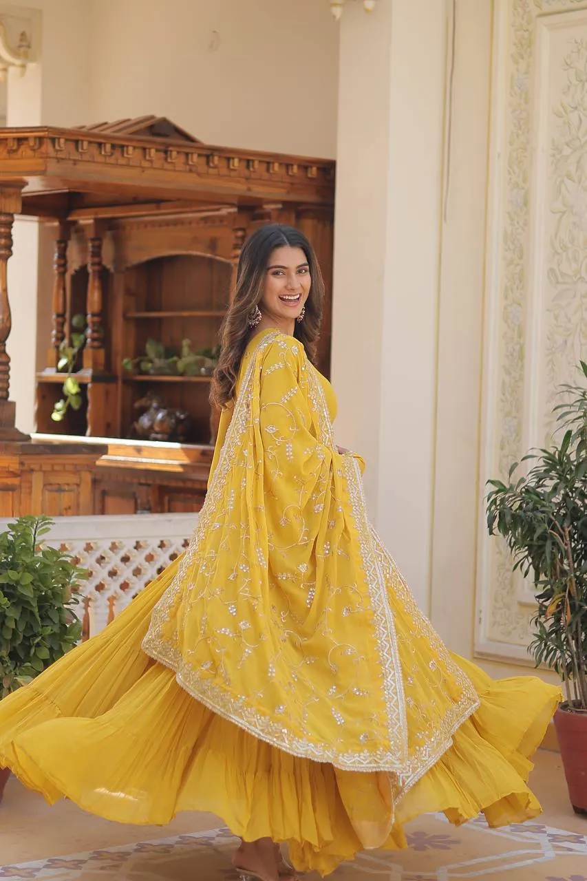 Yellow Captivating Unique Colored Faux Georgette Embroidered Gown with Sequined Dupatta